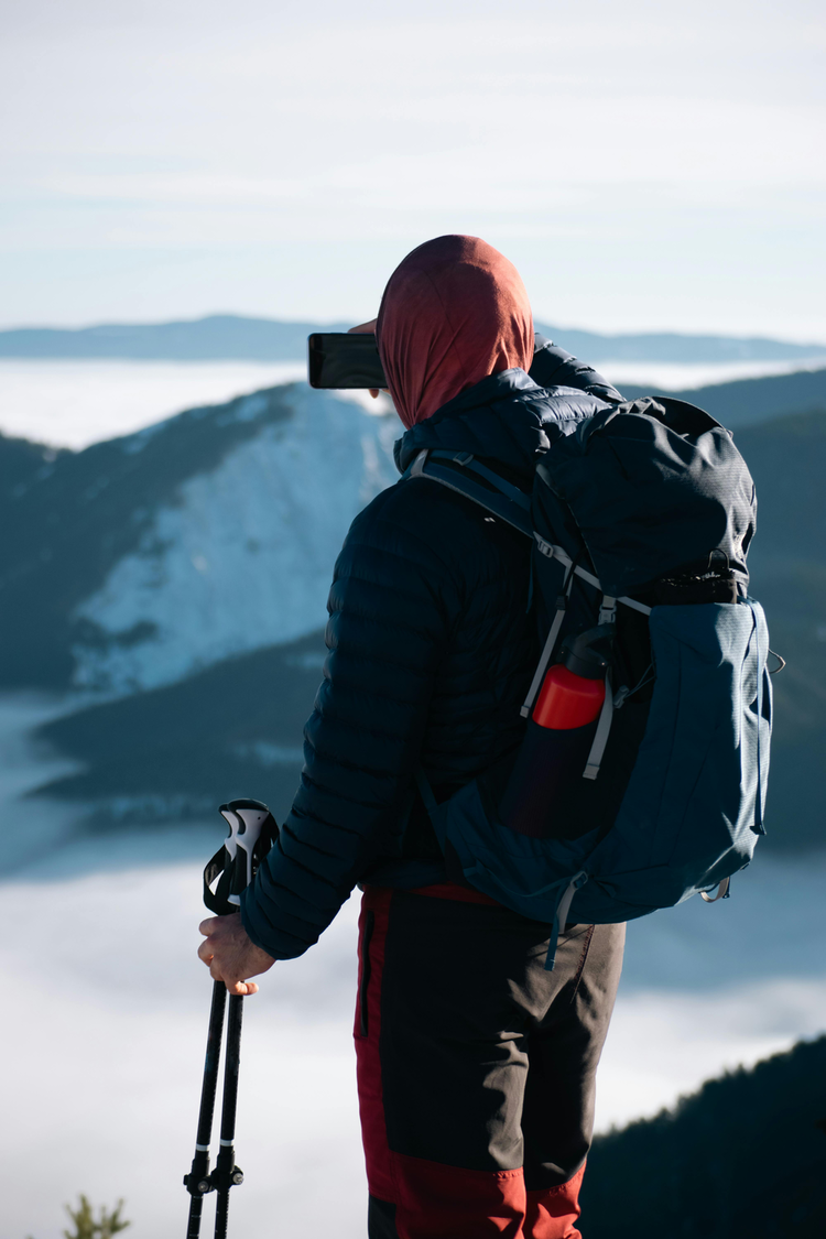 Premium custom outdoor hiking backpack featuring side bottle pocket, adjustable straps, and durable outdoor structure.